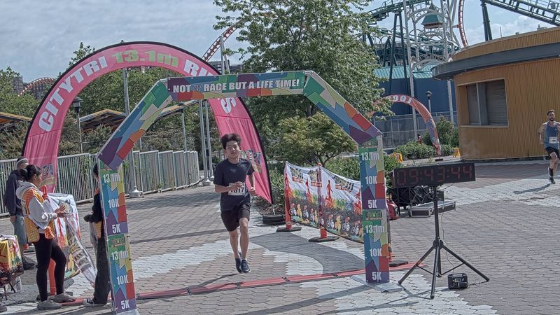 Running image for charlie kim in brooklyn beach half marathon 10k 5k 2023 june 04