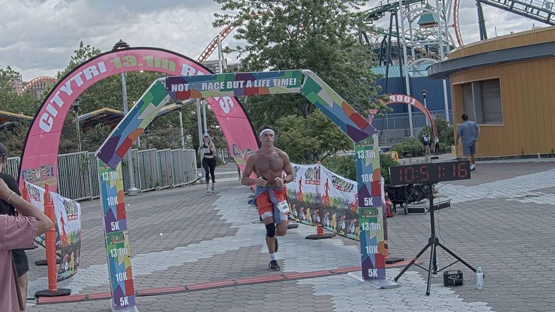 Running image for chris longo in brooklyn beach half marathon 10k 5k 2023 june 04