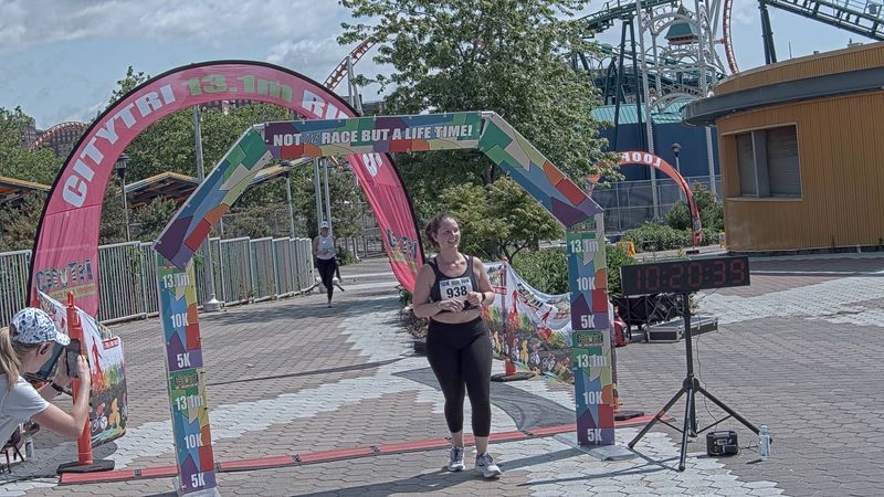 Running image for christine farolan in brooklyn beach half marathon 10k 5k 2023 june 04