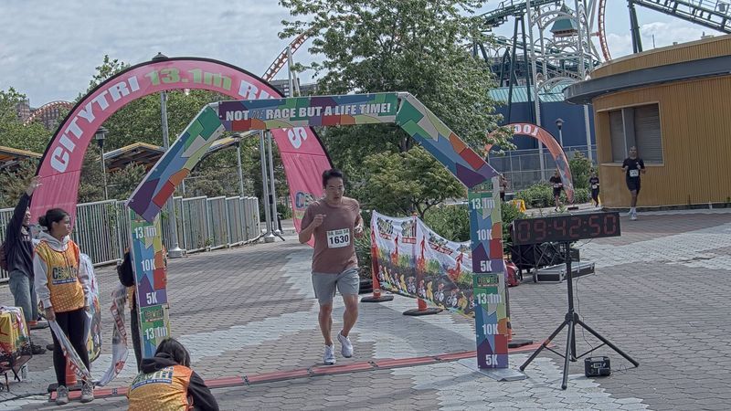 Running image for lorence kim in brooklyn beach half marathon 10k 5k 2023 june 04