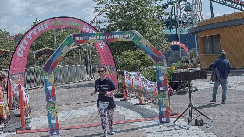 Running image for nancy balaban in brooklyn beach half marathon 10k 5k 2023 june 04