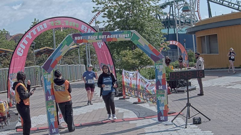 Running image for rabab ali in brooklyn beach half marathon 10k 5k 2023 june 04