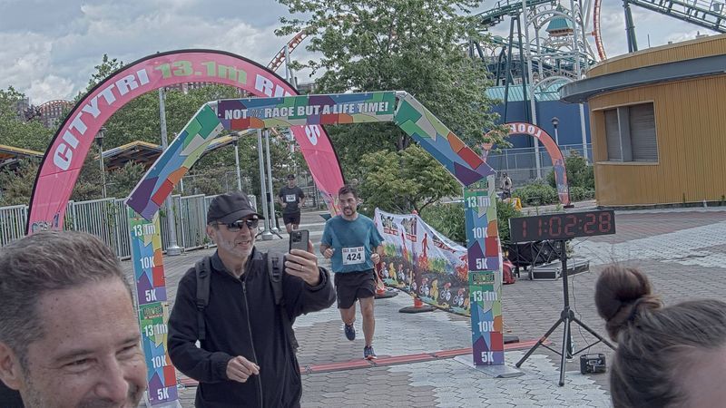 Running image for santi lara in brooklyn beach half marathon 10k 5k 2023 june 04