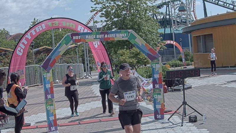 Running image for serina agosta in brooklyn beach half marathon 10k 5k 2023 june 04
