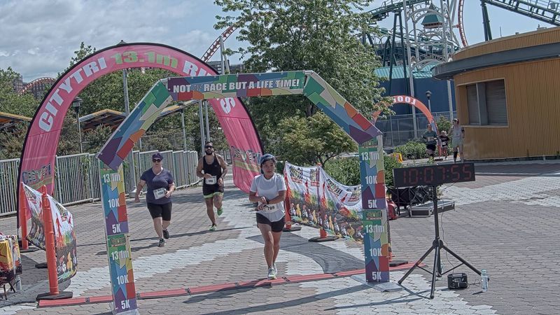 Running image for sheena wong in brooklyn beach half marathon 10k 5k 2023 june 04