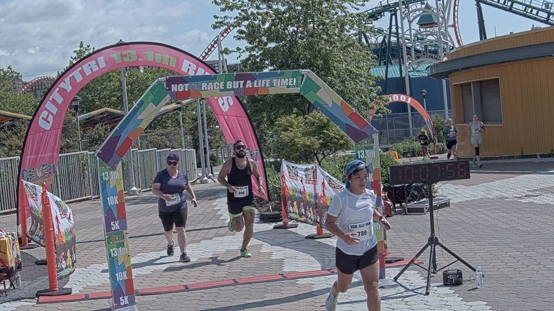 Running image for sheena wong in brooklyn beach half marathon 10k 5k 2023 june 04