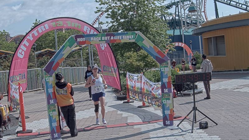 Running image for sherry hsiung in brooklyn beach half marathon 10k 5k 2023 june 04