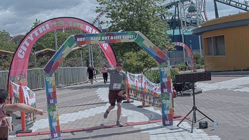 Running image for simcha schron in brooklyn beach half marathon 10k 5k 2023 june 04