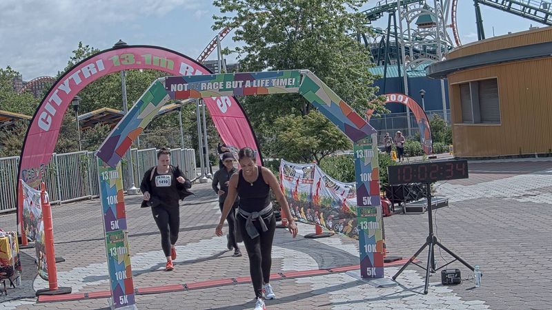 Running image for stefanie moyse in brooklyn beach half marathon 10k 5k 2023 june 04