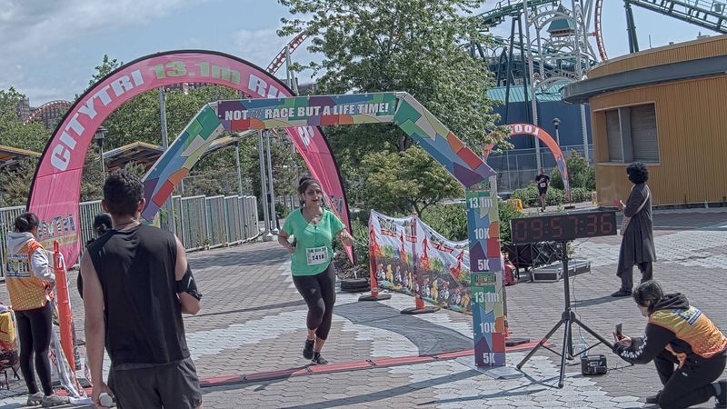 Running image for stella warkman in brooklyn beach half marathon 10k 5k 2023 june 04