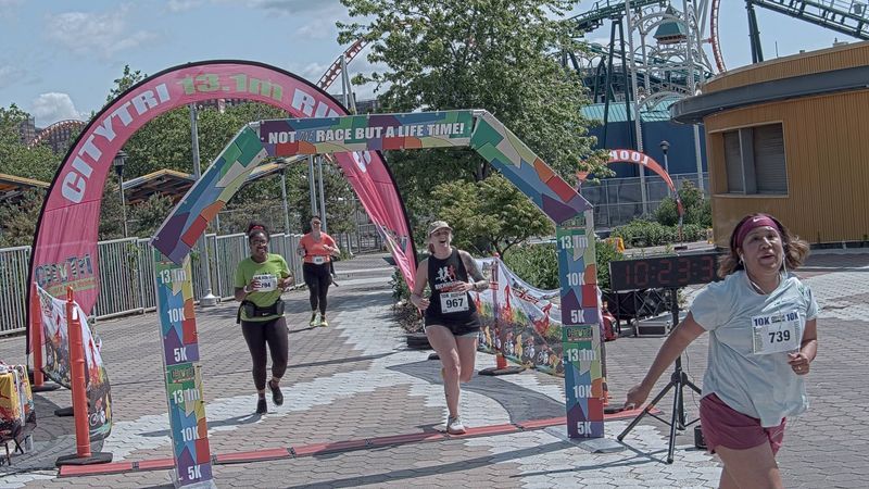 Running image for suzanne kirby in brooklyn beach half marathon 10k 5k 2023 june 04