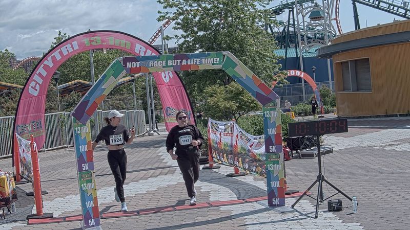 Running image for suzie clinchy in brooklyn beach half marathon 10k 5k 2023 june 04