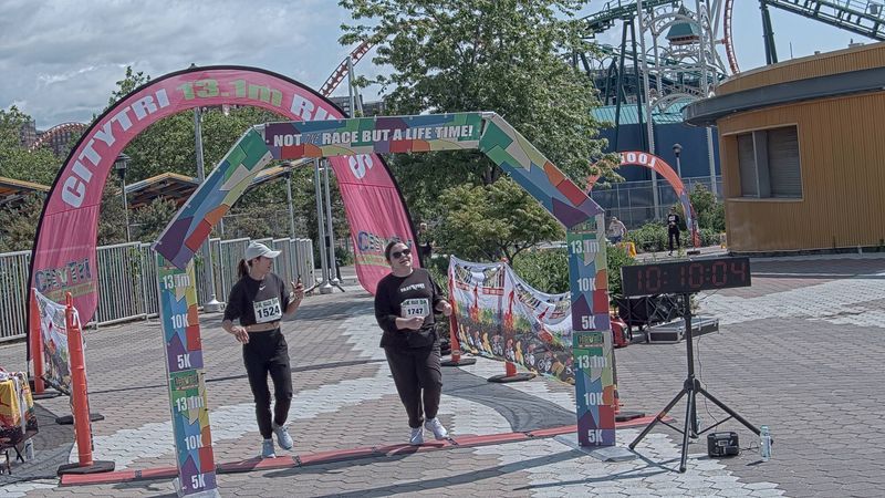 Running image for suzie clinchy in brooklyn beach half marathon 10k 5k 2023 june 04
