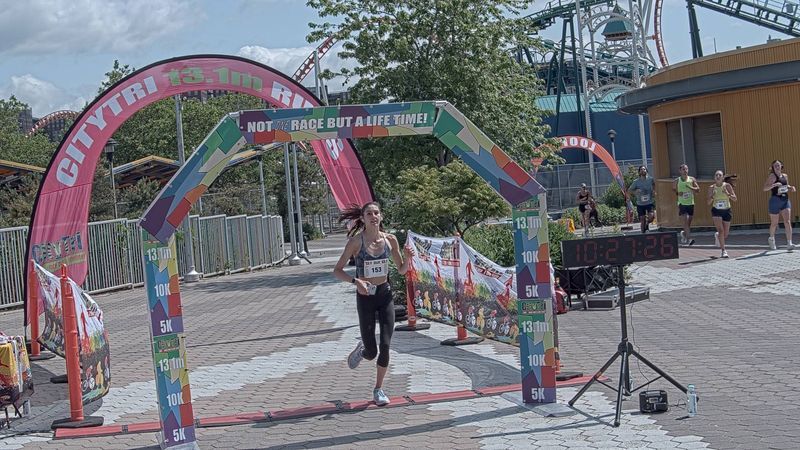 Running image for sydney georgiades in brooklyn beach half marathon 10k 5k 2023 june 04