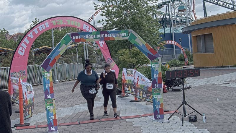Running image for tineka trotman in brooklyn beach half marathon 10k 5k 2023 june 04