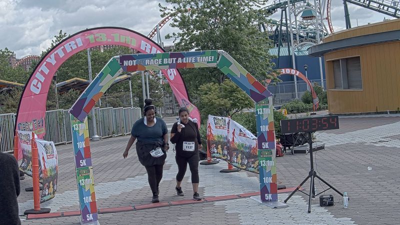 Running image for tineka trotman in brooklyn beach half marathon 10k 5k 2023 june 04