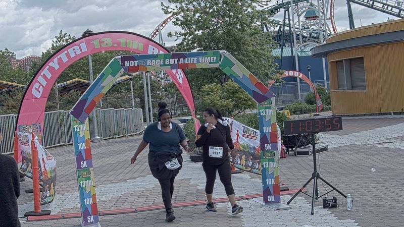 Running image for tineka trotman in brooklyn beach half marathon 10k 5k 2023 june 04