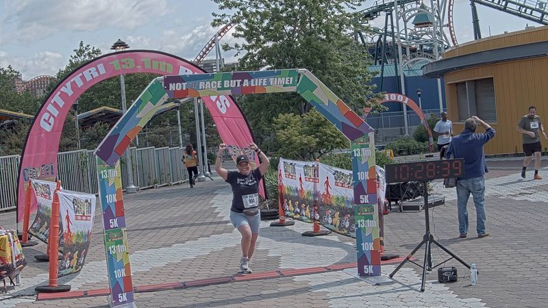 Running image for toni lucchesi in brooklyn beach half marathon 10k 5k 2023 june 04