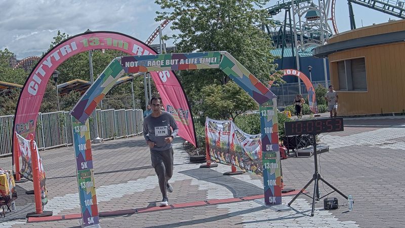 Running image for umesh tejwani in brooklyn beach half marathon 10k 5k 2023 june 04